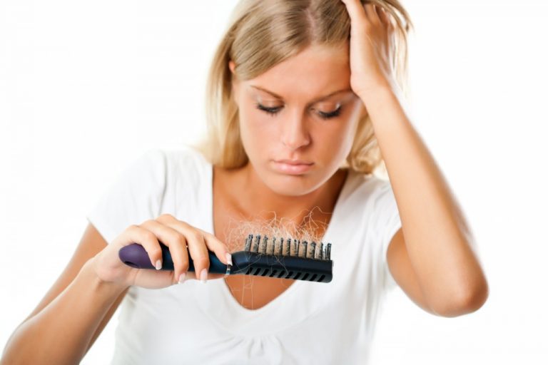 Blonde girl worried about hair loss,Hair loss