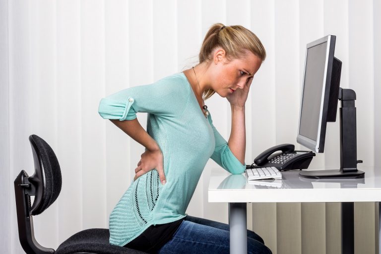woman suffering with backpain