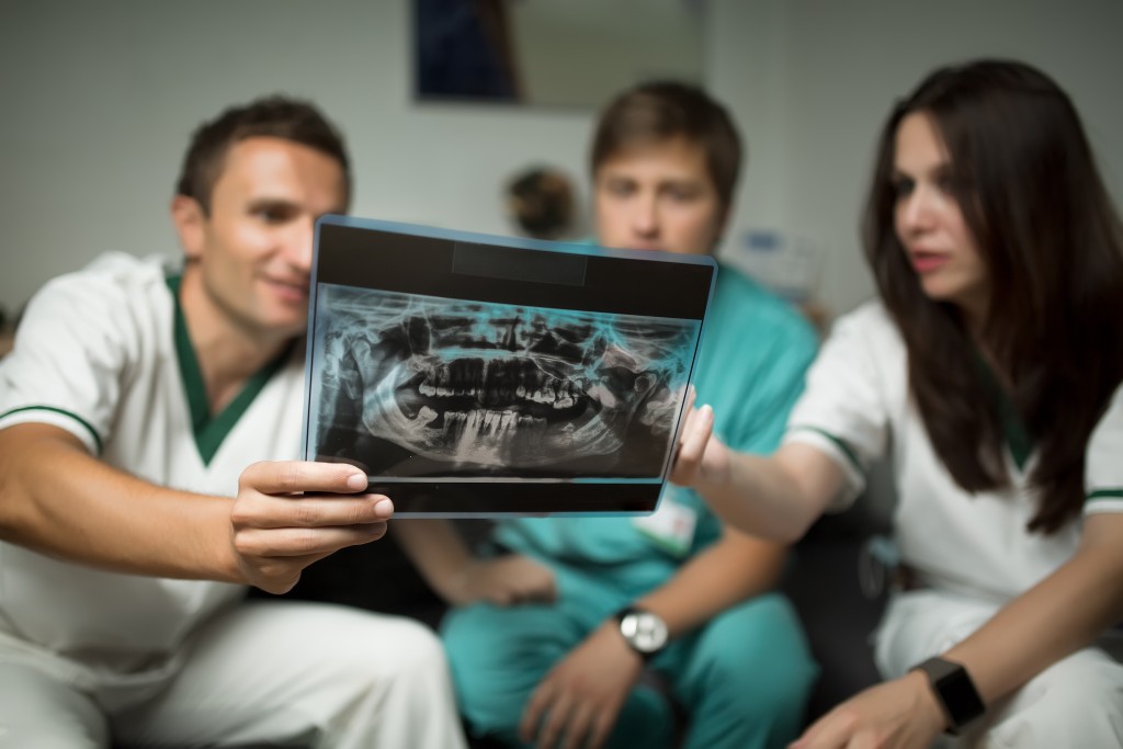 doctors examining an x-ray