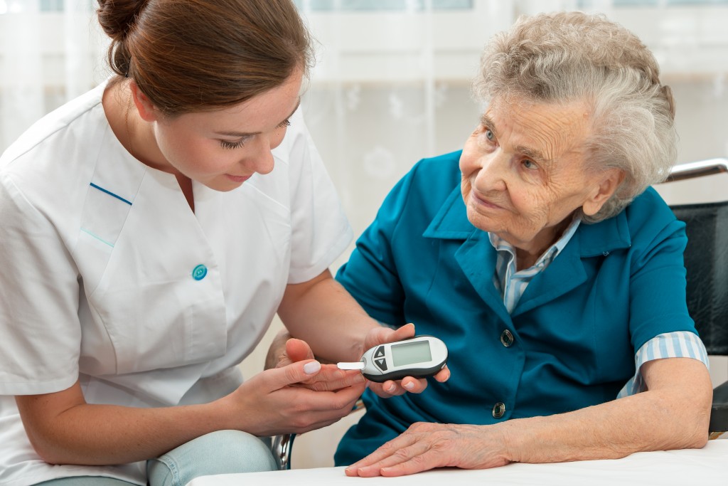 nurse and senior patient