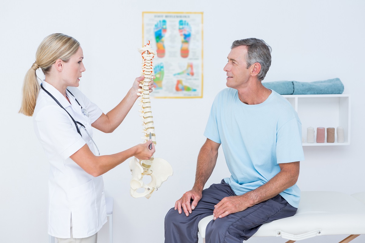 man consulting an orthopedist