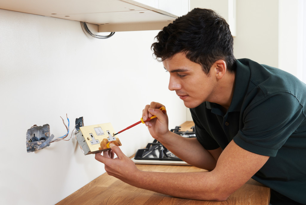 Man fixing socket