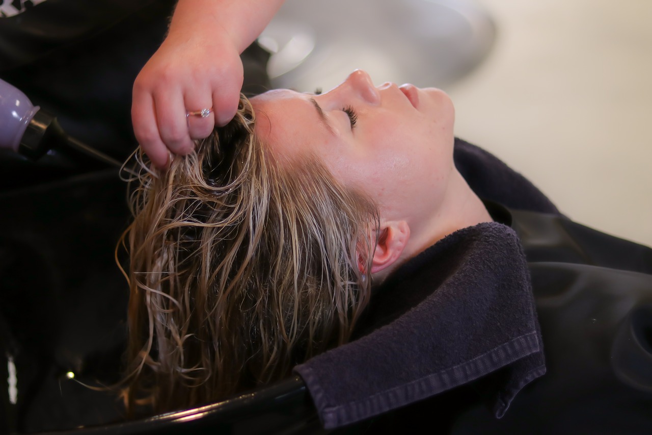 woman having her hair washed