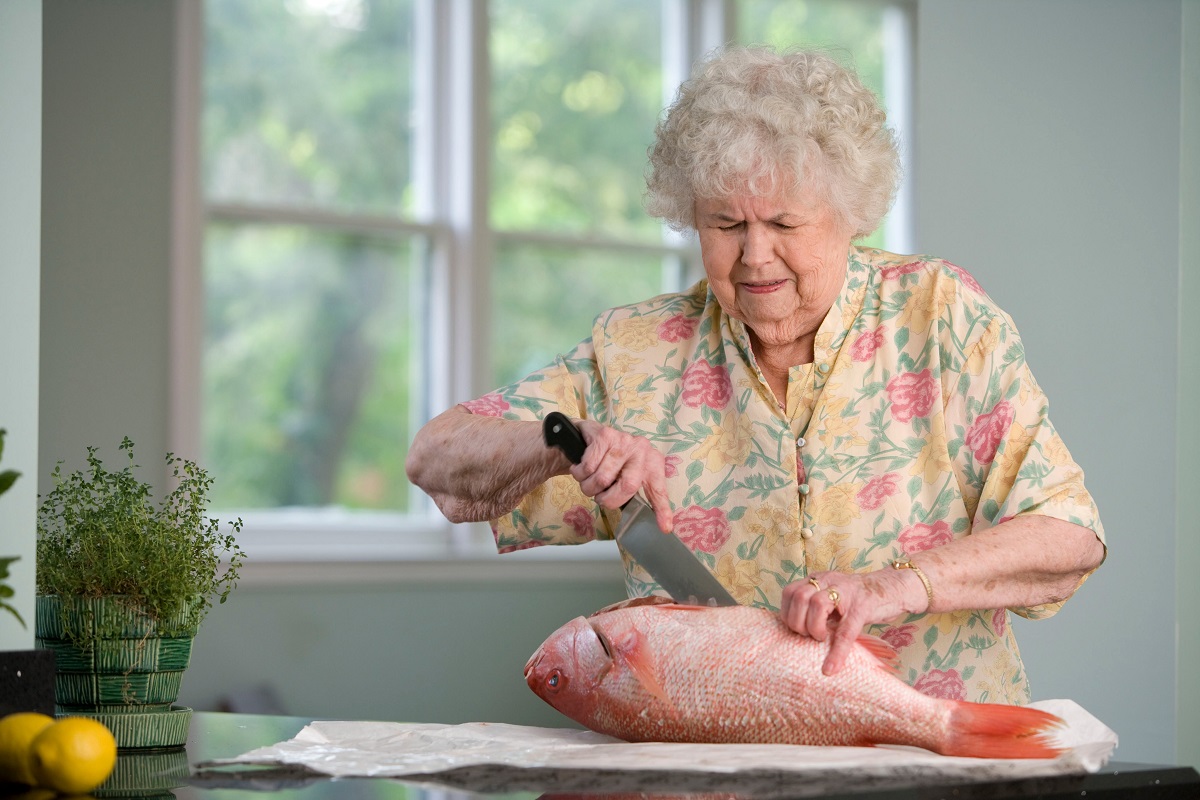 old woman preparing food