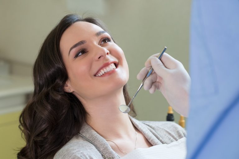woman getting dental implants