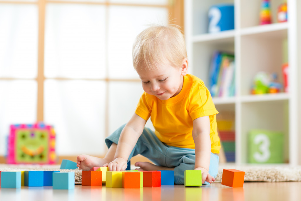 toddler playing with blocks