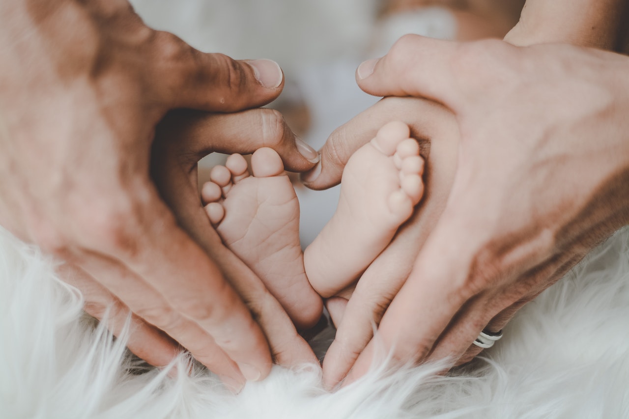 family parents with newborn