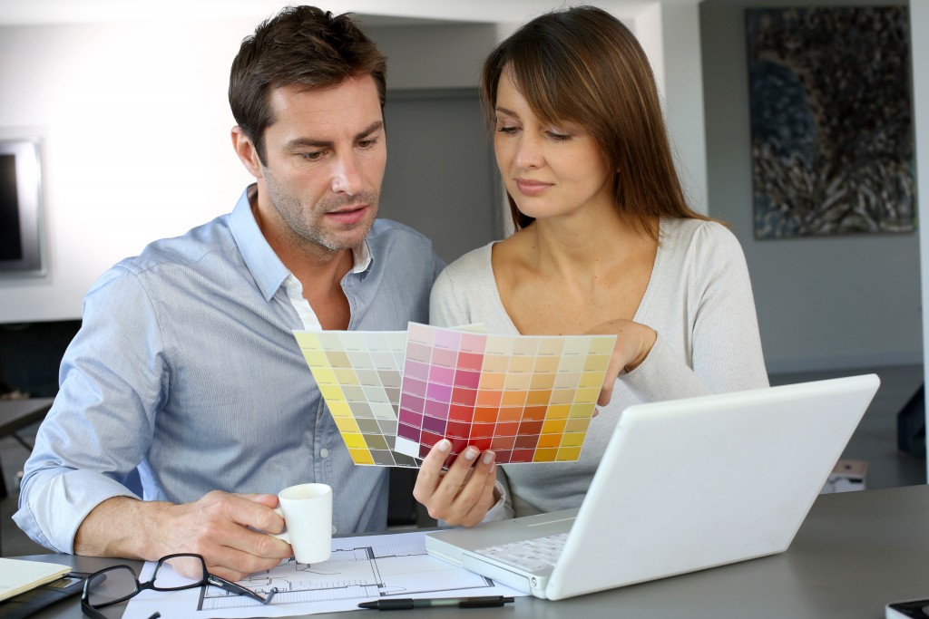 couple looking at color schemes