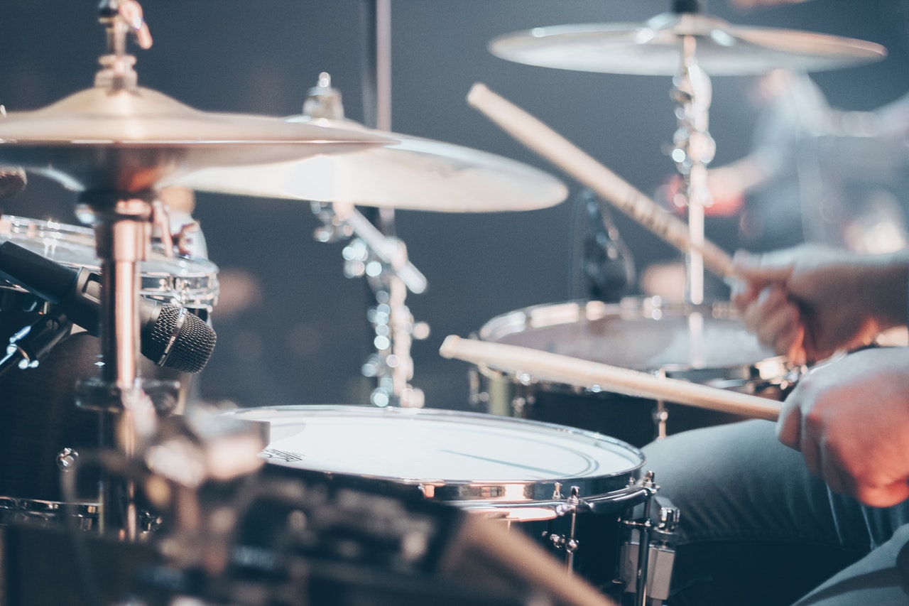 drum set being played during a live performance