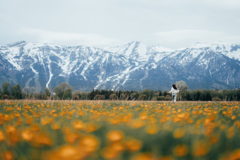 woman running through a field