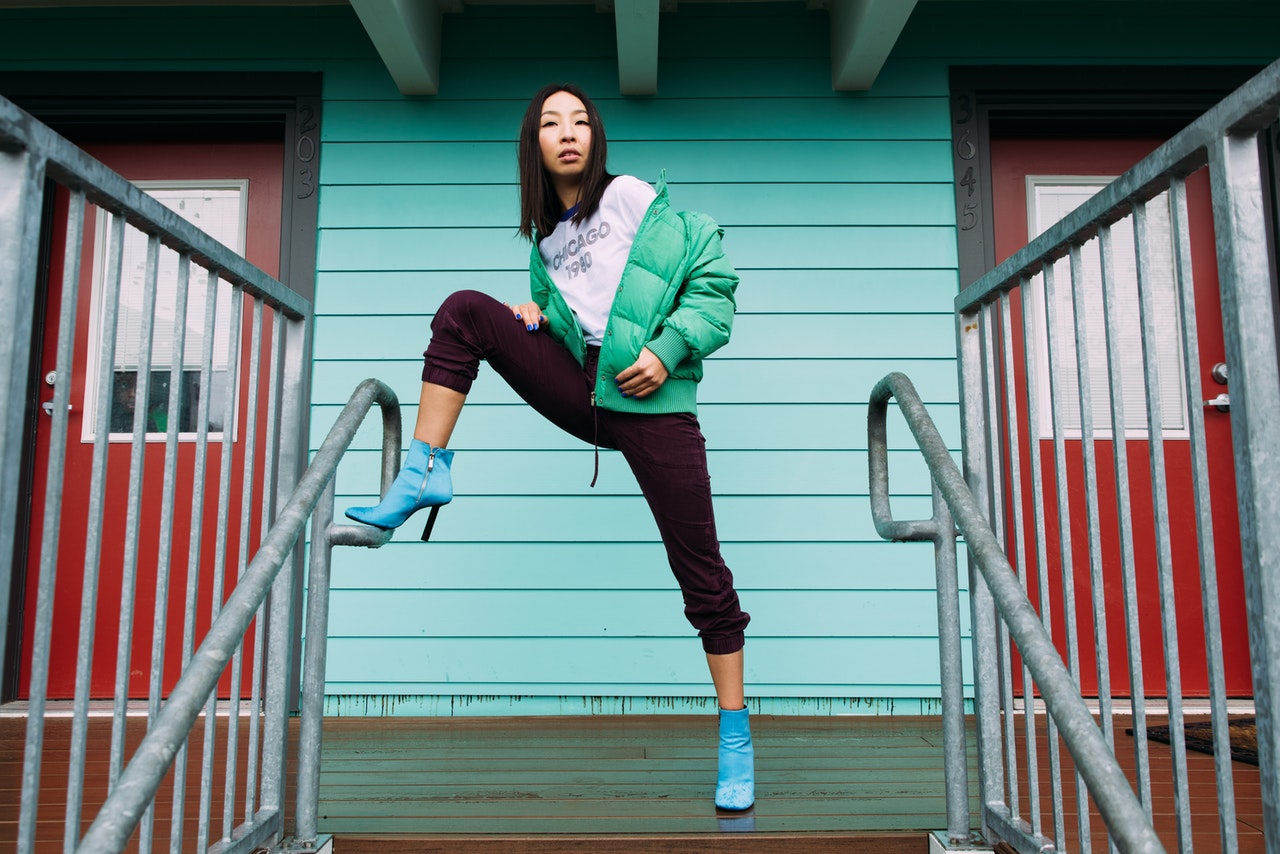 woman wearing green jacket