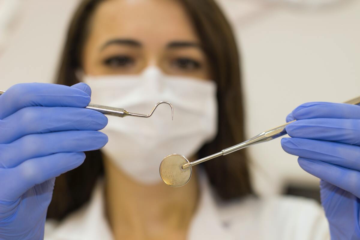 dentist holding equipment