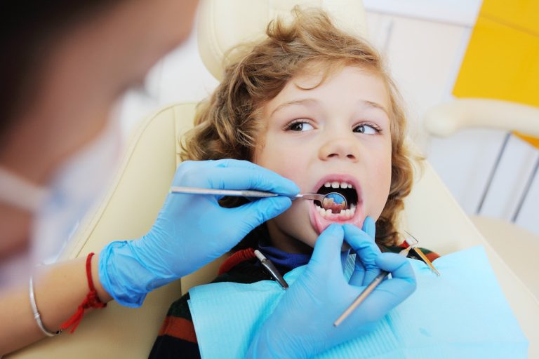 kid getting dental checkup