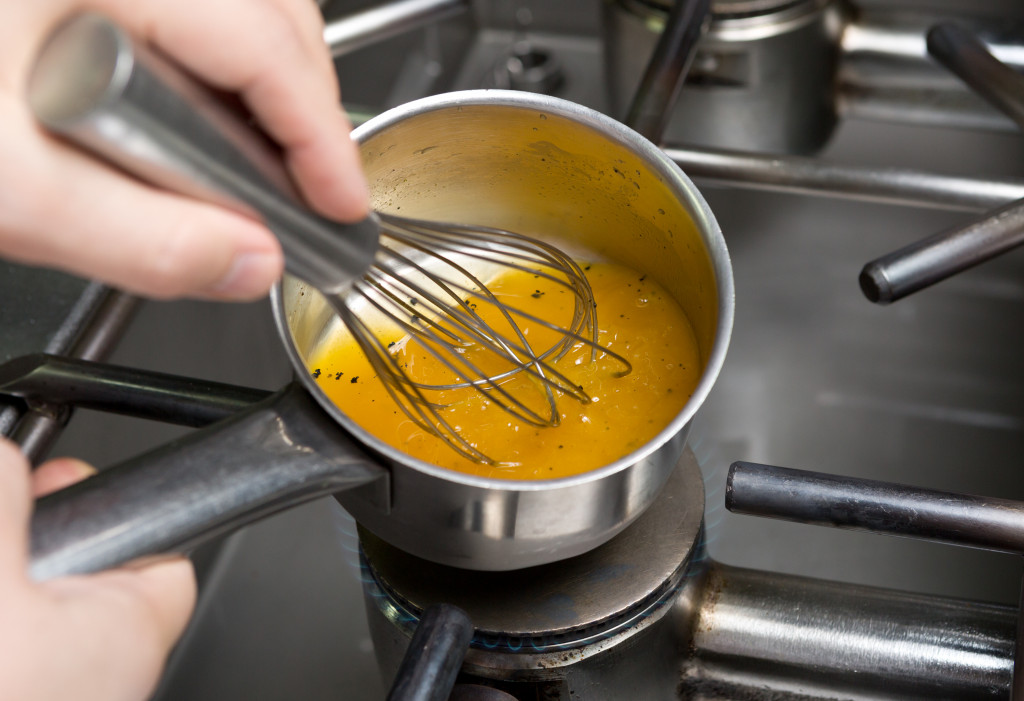 making a thick soup in a kitchen