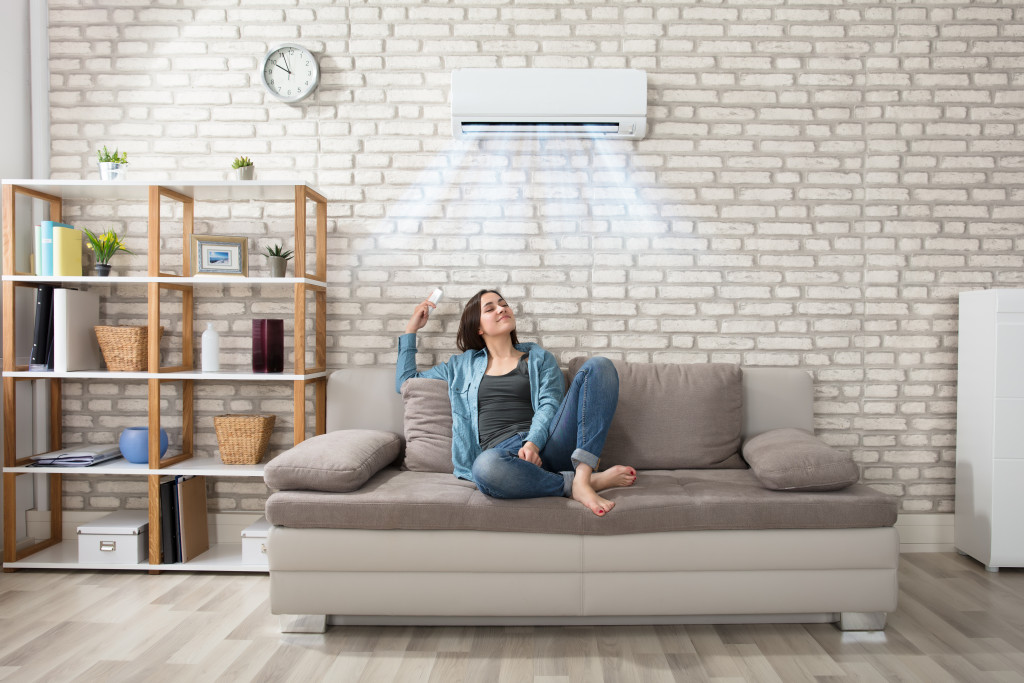 woman having a relaxing time at her living room