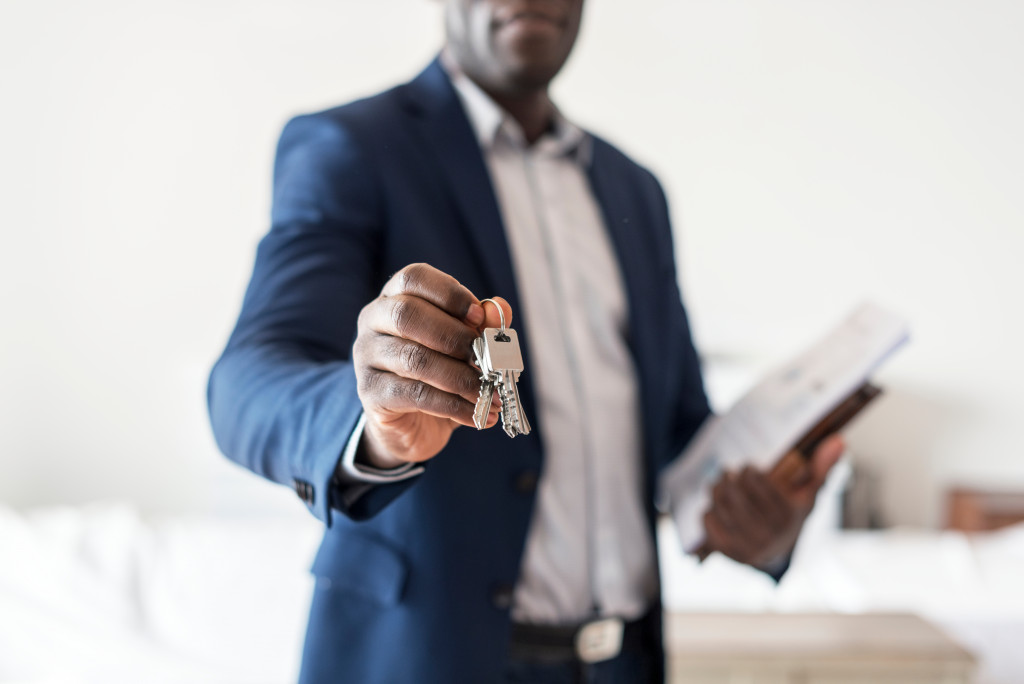 man handling the key