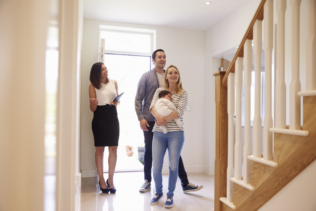 Family checking out a house for sale