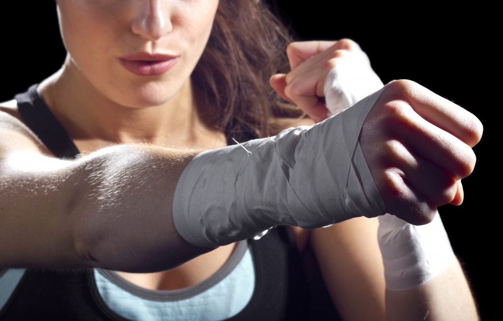 Woman who is in a boxing stance