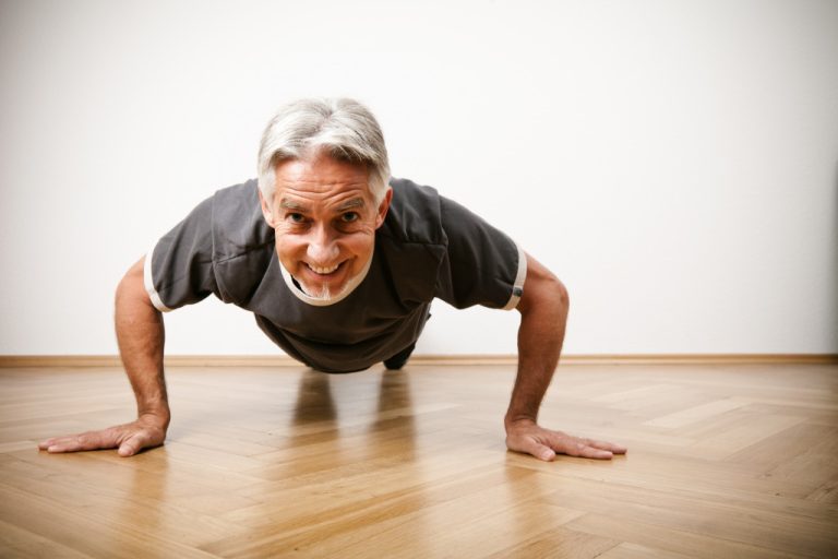 an old man exercising