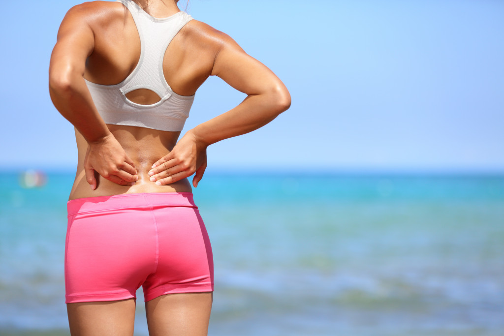 Woman having a back pain