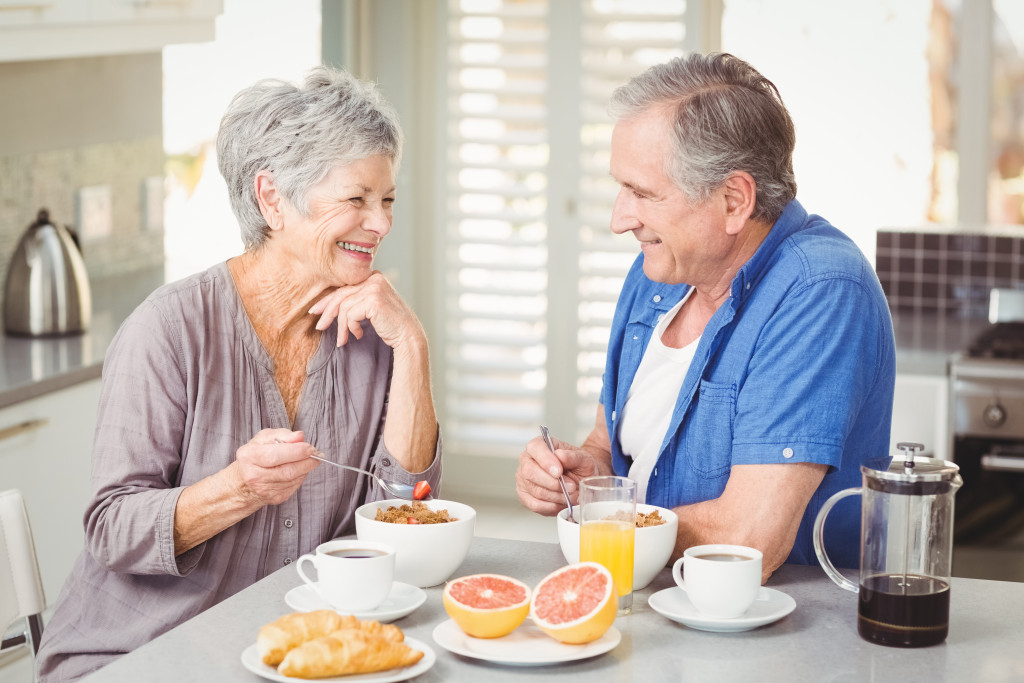 senior couple eating healthy meals