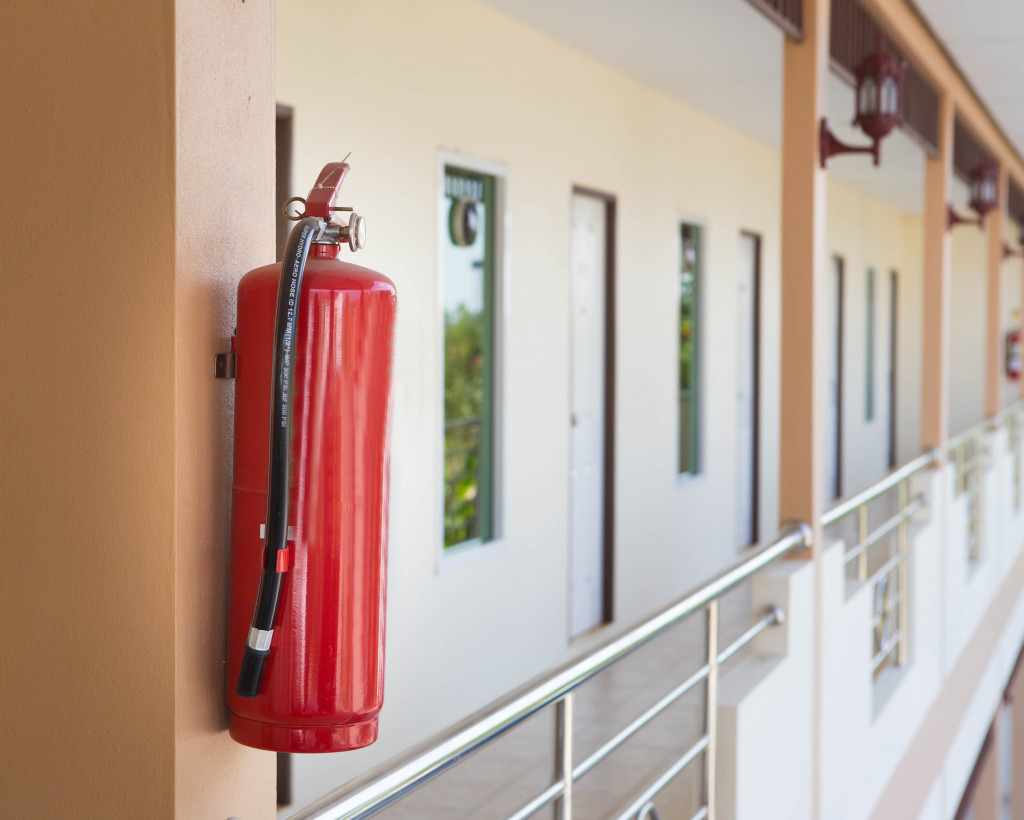 fire extinguisher at the end of a hall