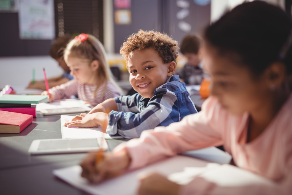 Young children busy with studying