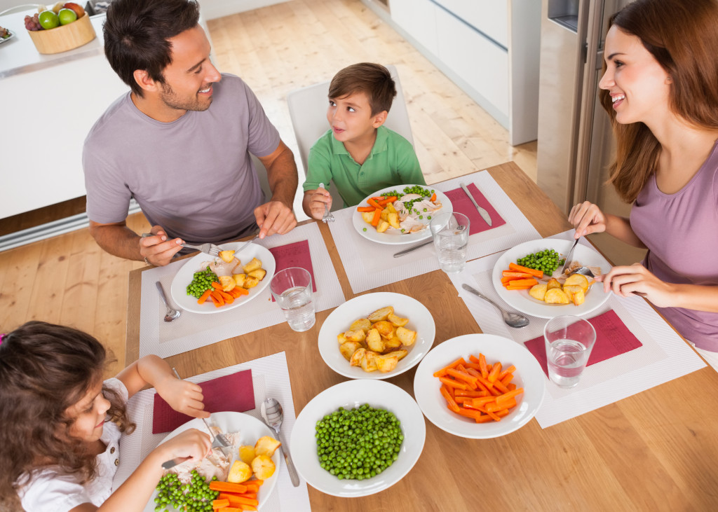 a family eating together and communicating during meals