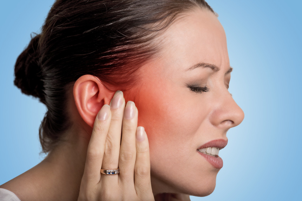 A woman having hearing problems