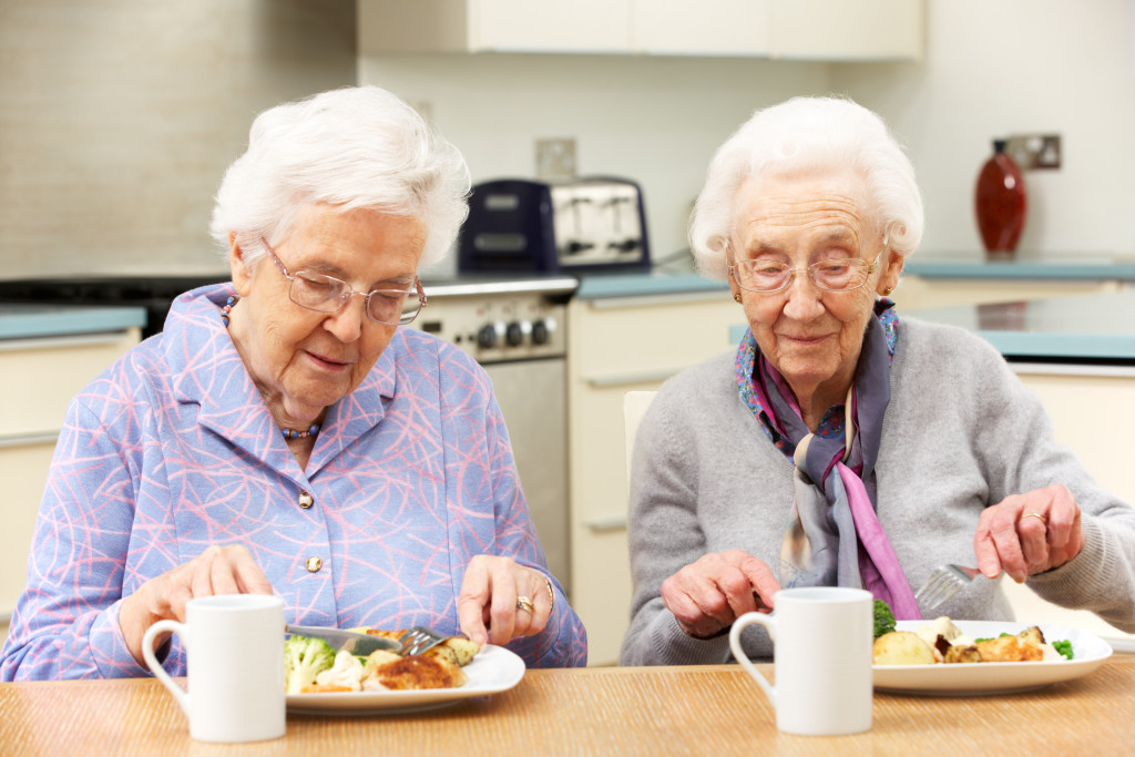 elderly ladies eating